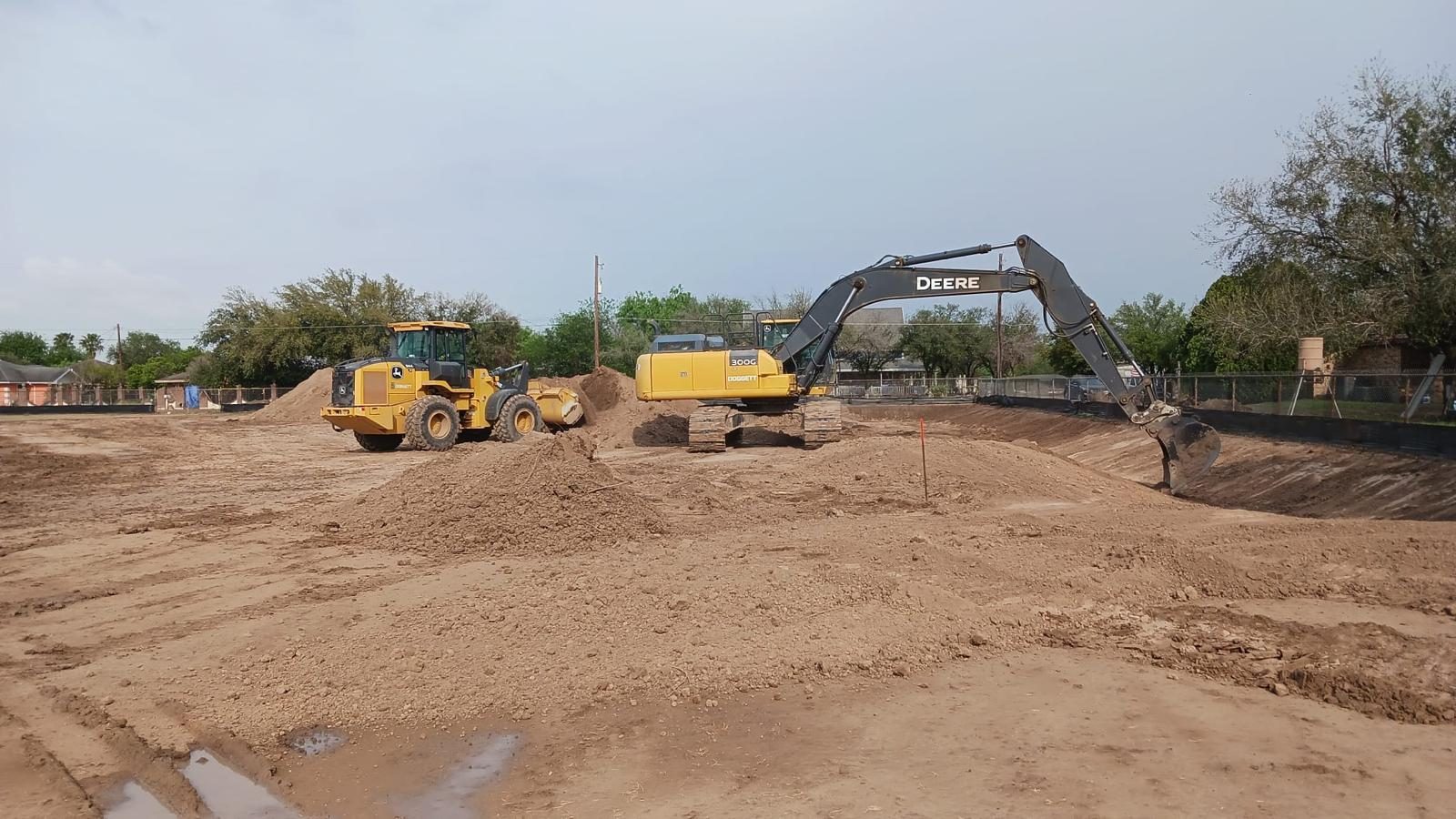 Excavator performing earthwork